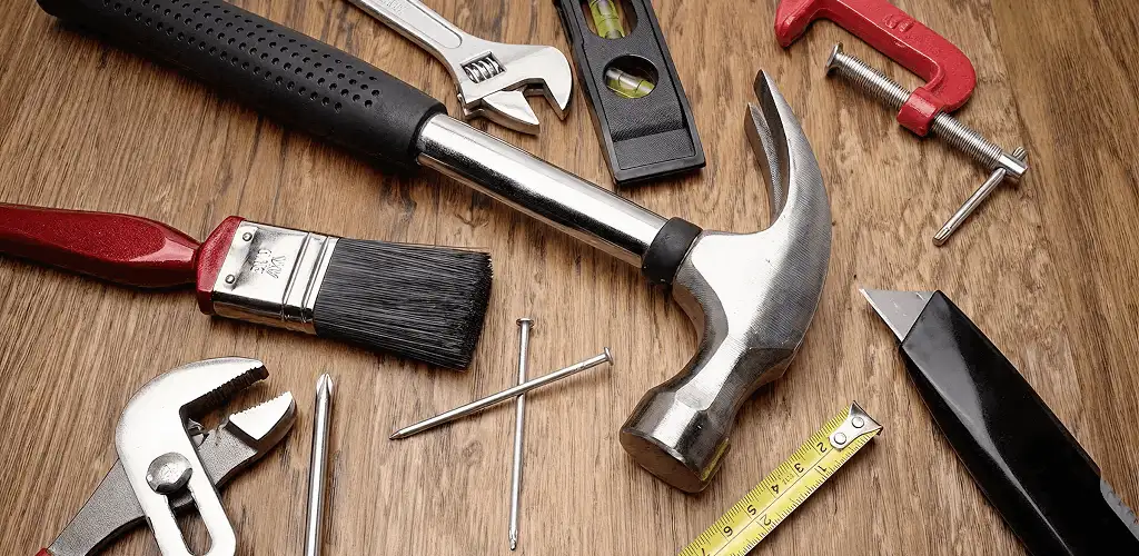 Handyman tools laid out for home repair and maintenance work in Overland Park, KS