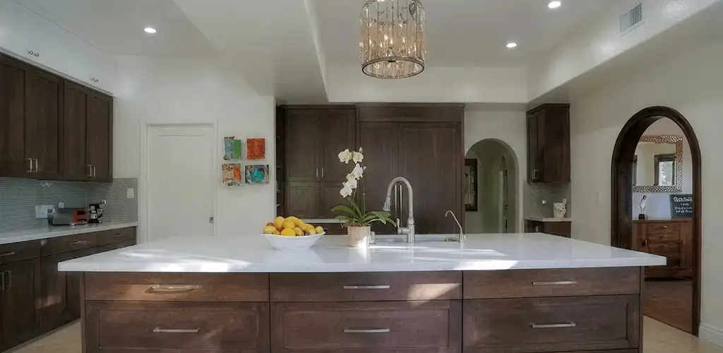 Cabinet refacing project with updated kitchen cabinets and island in Overland Park, KS